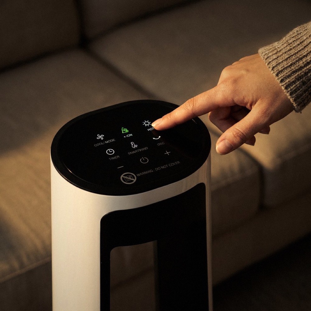 A finger presses HOT on the top touch panel