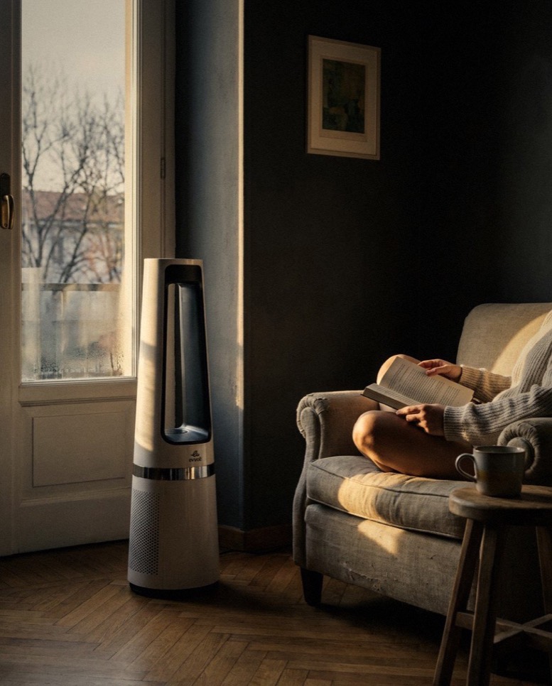 A reading corner on a cold afternoon, the evvoli tower beside the armchair